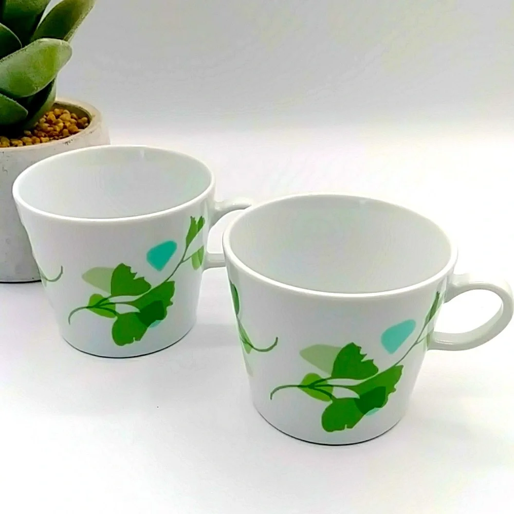 2 IKEA Stilenlig White Mugs With Ginko Leaves.